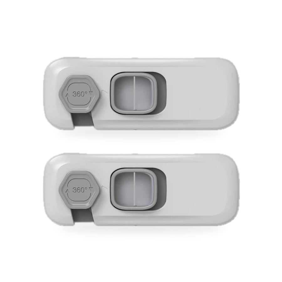 Two grey adhesive refrigerator locks with square slide buttons on a white background