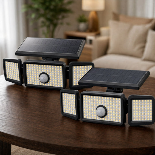 Two black TremShield three-head solar motion security lights with LED panels