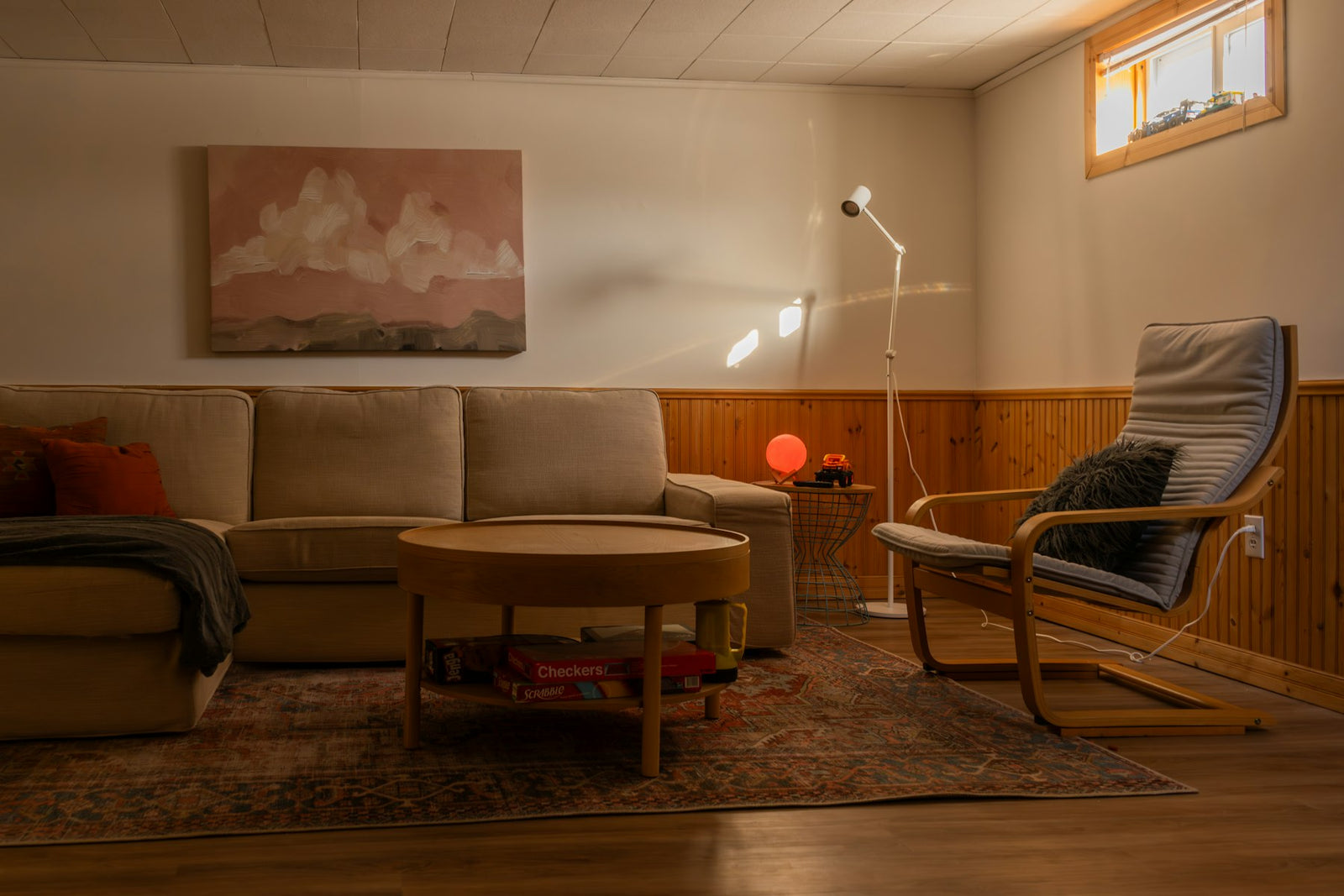 Cozy living room with a sectional couch and armchair