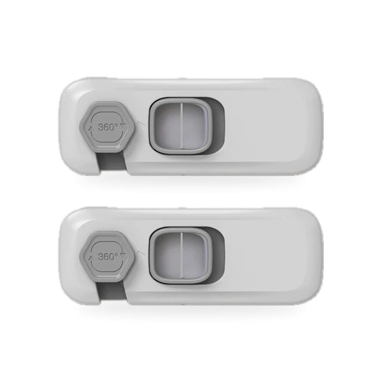 Two grey adhesive refrigerator locks with square slide buttons on a white background