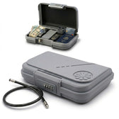 Gray compact combination lock box shown open with cash, cards and a passport, and closed with its security cable