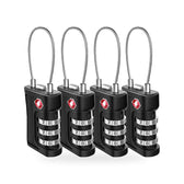 Four black TSA-accepted combination luggage locks with flexible steel cable shackles on a white background